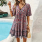 🔥Köp 2 få 10% rabatt👗Women's Flower Print V Neck Kort ärm miniklänning