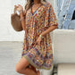 🔥Köp 2 få 10% rabatt👗Women's Flower Print V Neck Kort ärm miniklänning